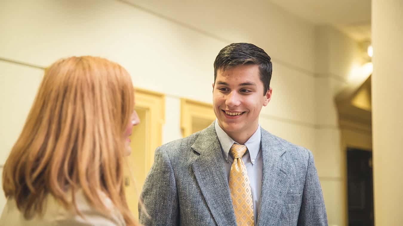 Graduates on campus: Explore the Bachelor of Science in Professional Studies - Business degree program offered by Regent University.