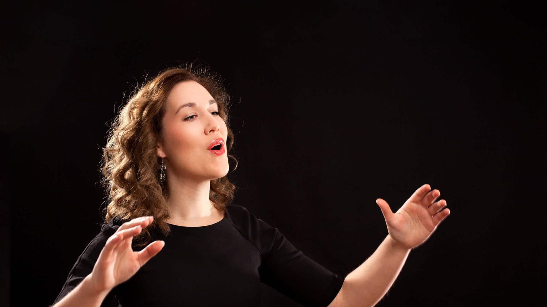 A singer performing: Explore Regent's Bachelor of Music degree program.