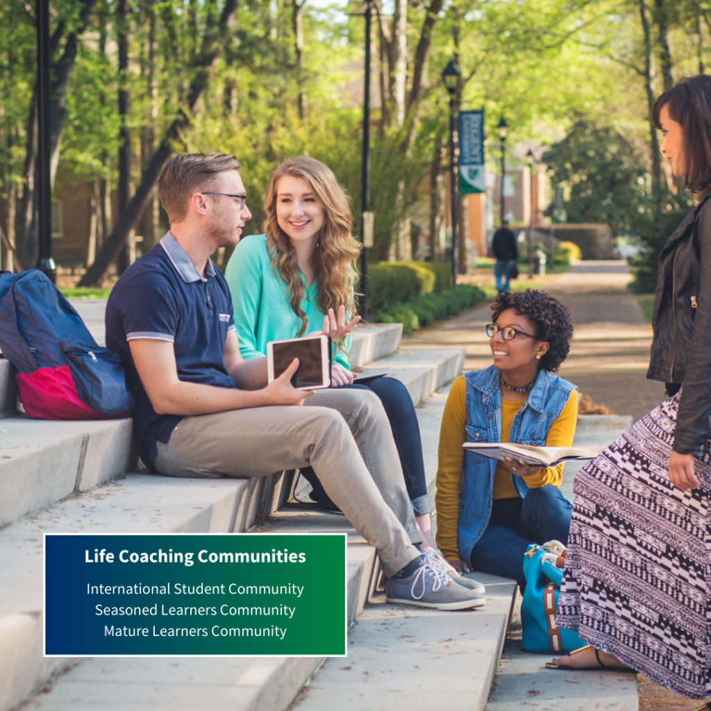 A life coaching community of students together outside at Regent University, a Christian college in Virginia Beach.