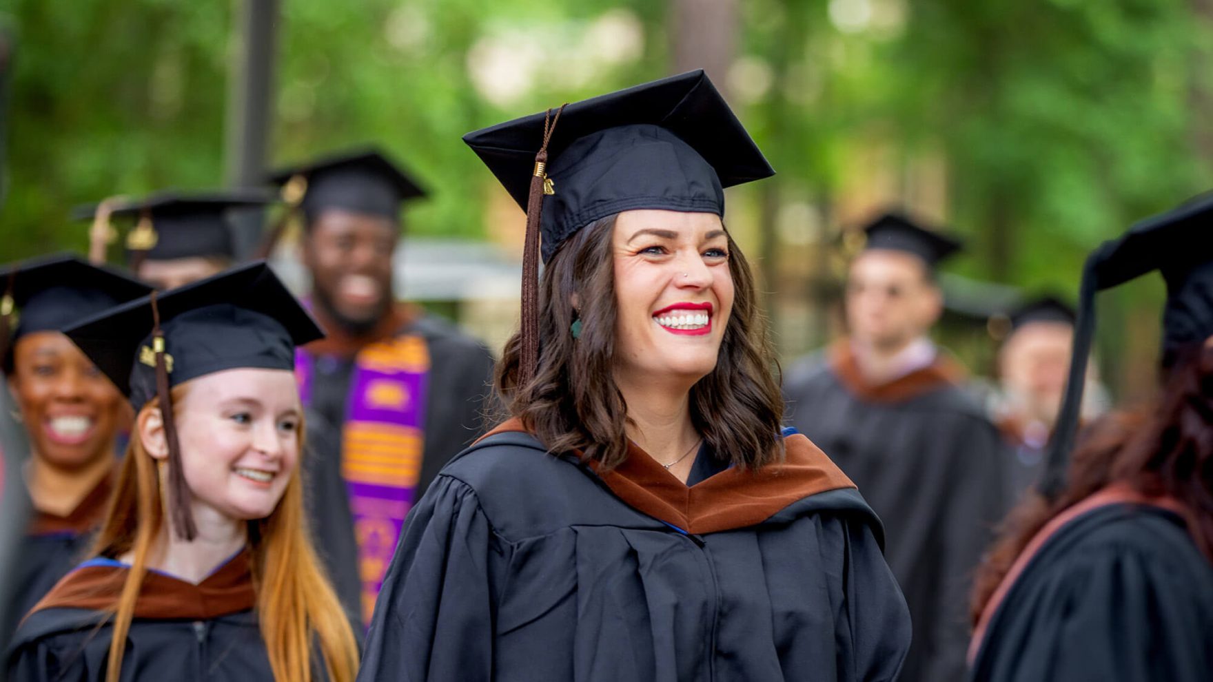 A Regent university Graduate at the commencement ceremony in Virginia Beach, VA.